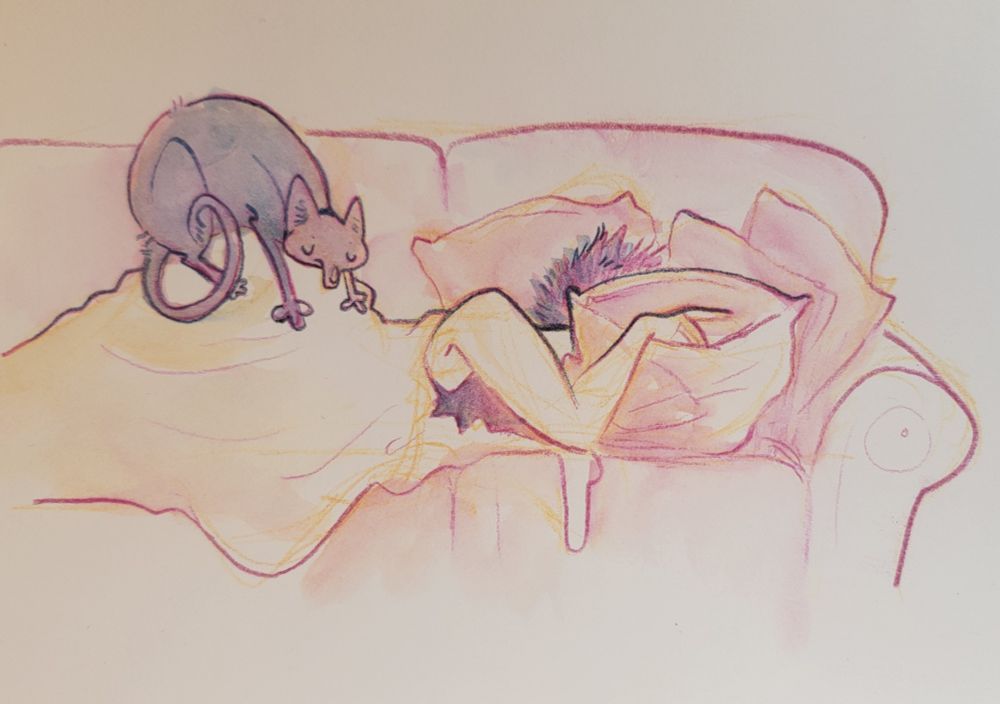 A person trying to sleep on a couch with their head buried in pillows. A cat is very comfortably sitting on their butt