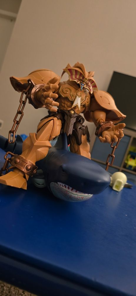 Exodia riding a shark

