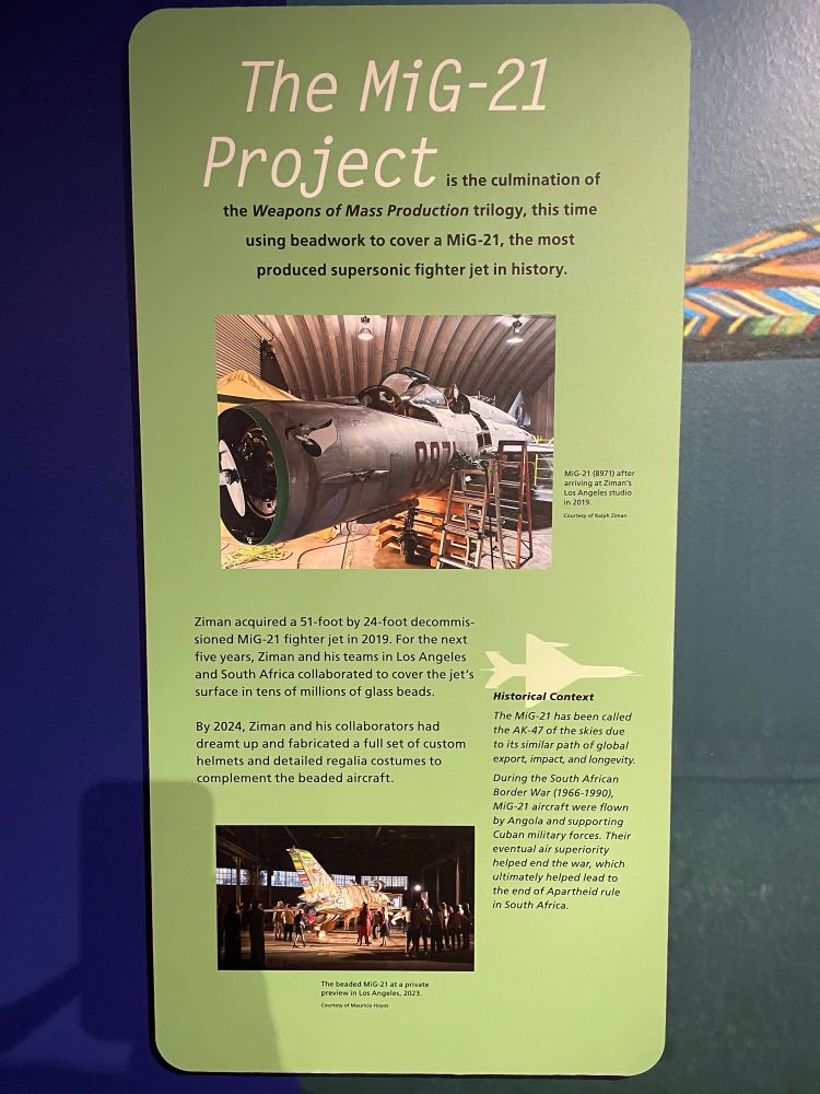 A sign with an synopsis of The MiG-21 Project. 