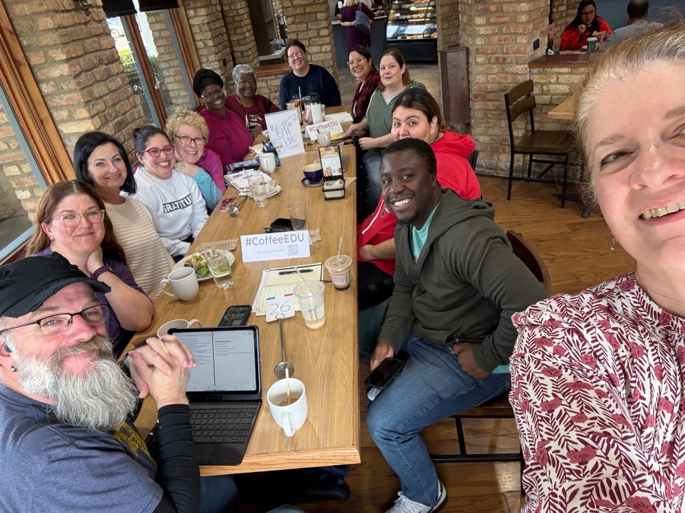 Photo of group of educators around a large table