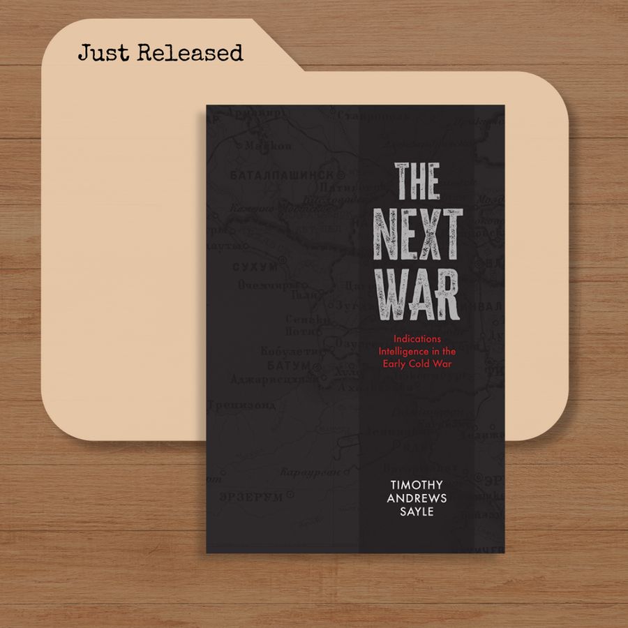 The cover for the book The Next War: Indications Intelligence in the Early Cold War by Timothy Andrews Sayle, which shows a map of Soviet Russia overlaid on a dark background, placed on top of a graphic of a file folder which bears the label "just published."