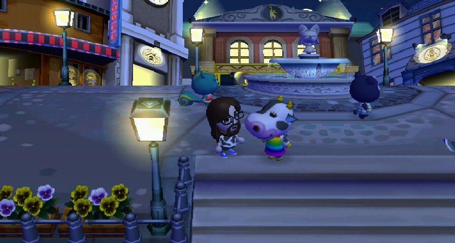 Me and Tipper out of Animal Crossing. She has an enormous head and a rainbow jumper.
