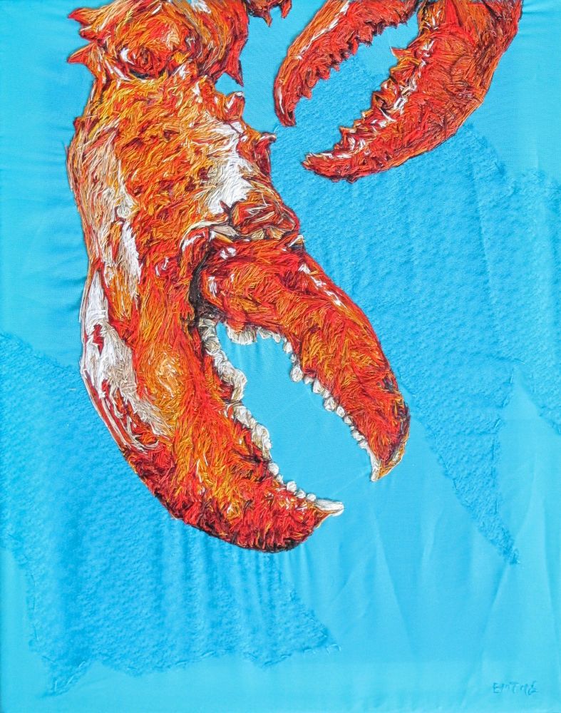 Hand embroidered cooked lobster claws on a bright turquoise blue fabric 