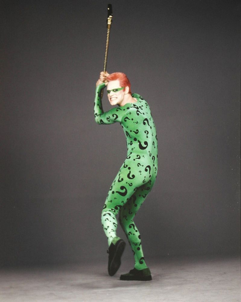 Promotional/Publicity Photo of Jim Carrey as The Riddler from Batman Forever, doing a batter up pose. 