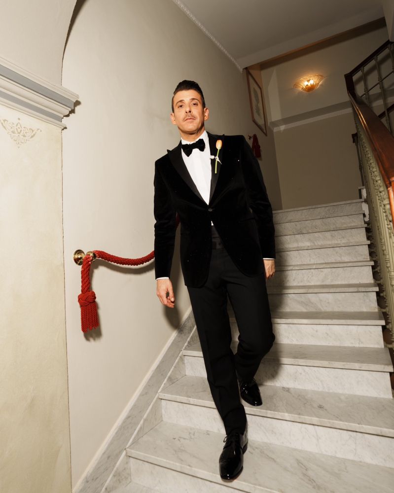 Francesco Gabbani standing on a staircase