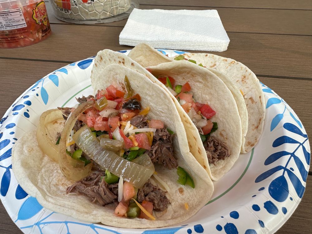 3 tacos on a paper plate