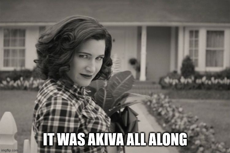 Black-and-white picture of Agatha Harkness from "Wandavision" smiling menacingly at the camera. The bottom caption says "IT WAS AKIVA ALL ALONG" in white block letters.
