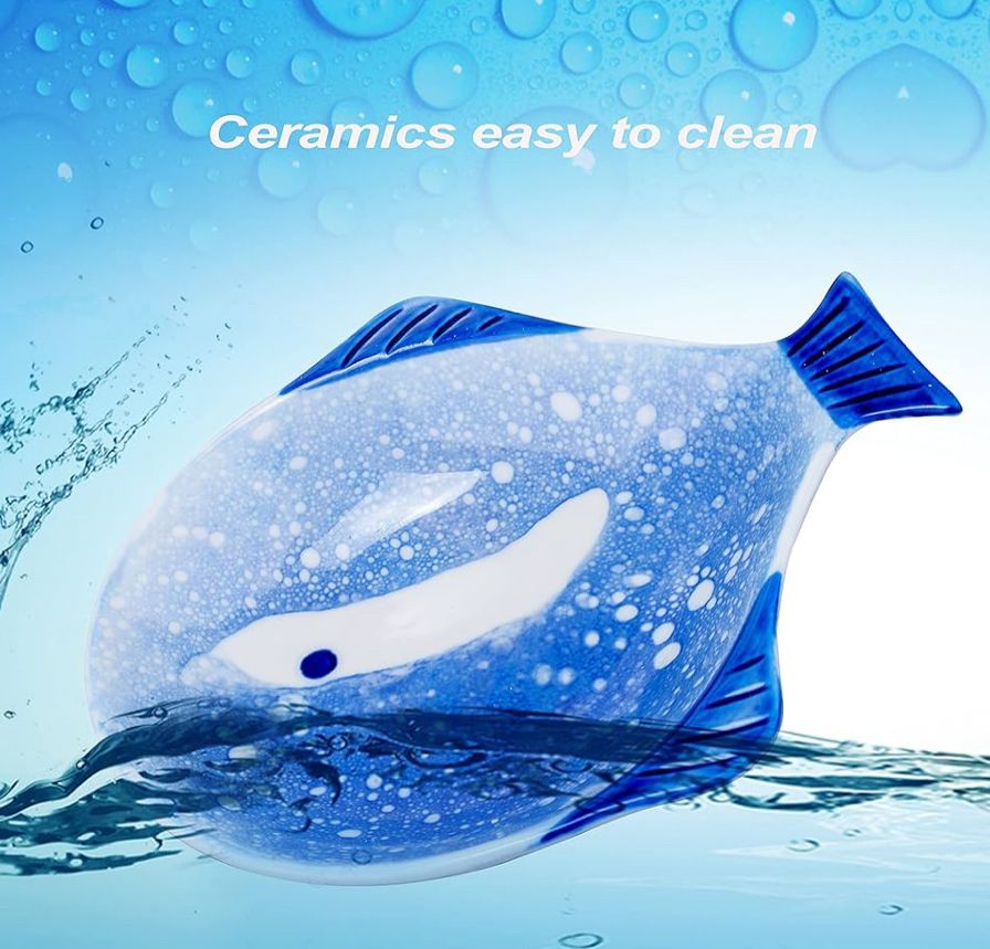 A picture of a spoon rest shaped like a fish. 
This time the background is a stock photo of water droplets. 
The foreground is a picture of the top of some water that they’ve attempted to make the fish spoon rest look like it’s diving into. 

At the top of the image in white text: 
“Ceramics easy to clean” 