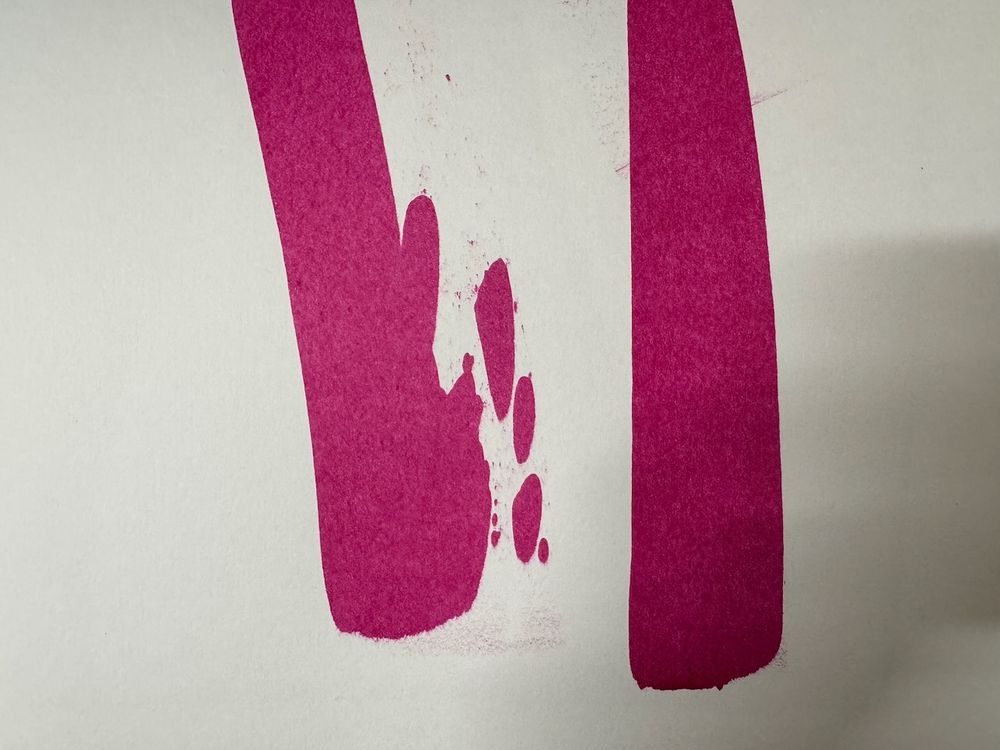 Samples of two quinacridone magenta paints, one from Golden and one from Liquitex. They look the same although the Golden one is twice the price.