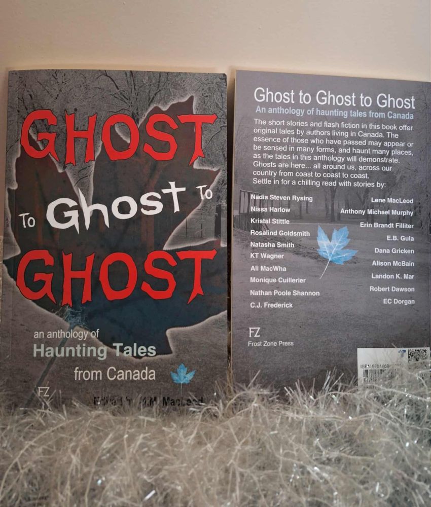 Paperback of Ghost to Ghost to Ghost anthology; 2 copies. On left front cover is showing - title in red and white, an anthology of Haunting Tales from Canada and a tiny blue maple leaf, edited by M.M. MacLeod, atop a translucent maple leaf behind which is a winter scene of bare, ice-coated trees. On right is a copy with back of cover showing Ghost to Ghost to Ghost, a blurb, then list of authors in two columns with a translucent blue maple leaf in centre and a background continuing the winter ice-covered trees scene. Authors listed on left: Nadia Steven Rysing, Nissa Harlow, Kristal Stittle, Rosalind Goldsmith, Natasha Smith, KT Wagner, Ali MacWha, Monique Cuillerier, Nathan Poole Shannon, C.J. Frederick. On right: Lene MacLeod, Anthony Michael Murphy, Erin Brandt Filliter, E.B. Gula, Dana Gricken, Alison McBain, Landon K. Mar, Robert Dawson, EC Dorgan