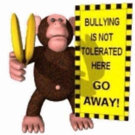 Monkey with two bananas and a sign that says "Bullying is not tolerated here GO AWAY!"