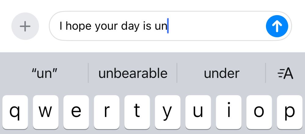 A screenshot of an iMessage saying “I hope your day is un” and suggests saying “unbearable” instead of the word “uneventful”