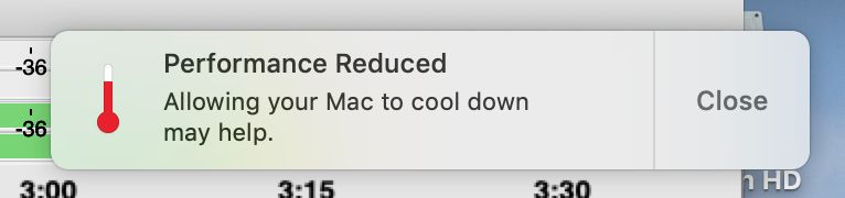 Screenshot of a Mac OS notification that says "Performance Reduced  Allowing your Mac to cool down may help."