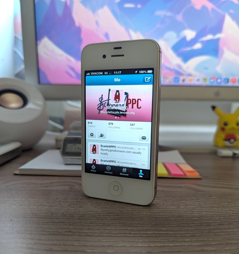 Pic of a white iPhone 4S standing upright with Twitter open on my Bluesky account (using a bridge)