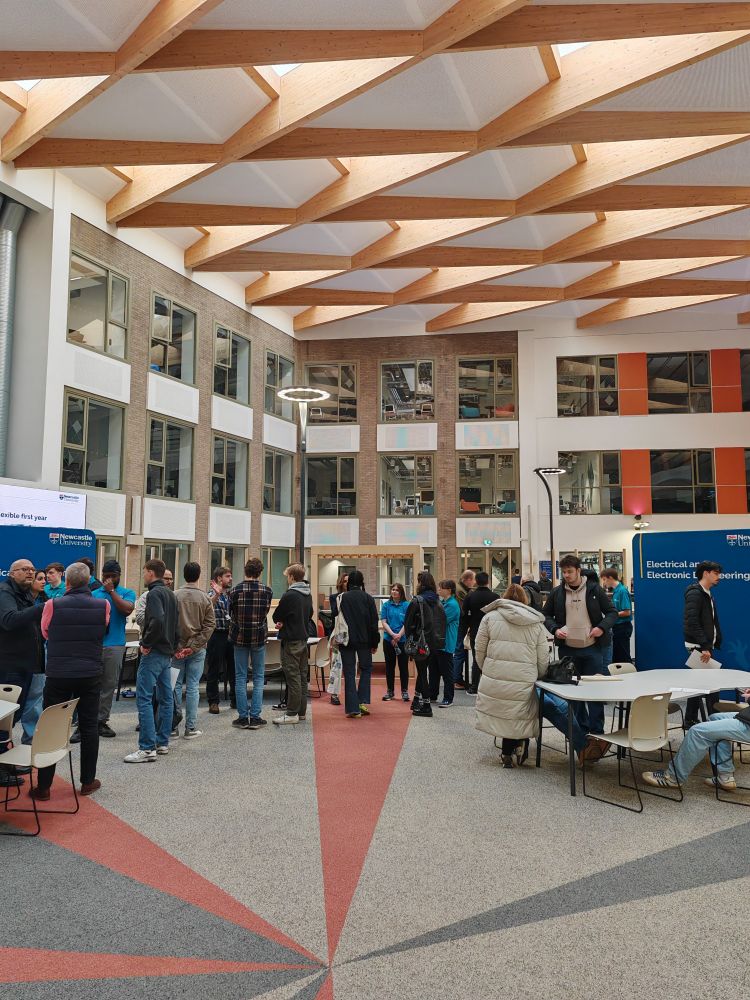 A photo of visitors at the event in the atrium of the Stephenson Building.