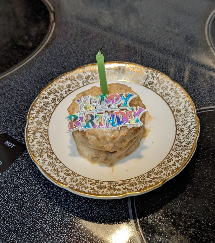 Pupcake with happy birthday and candle