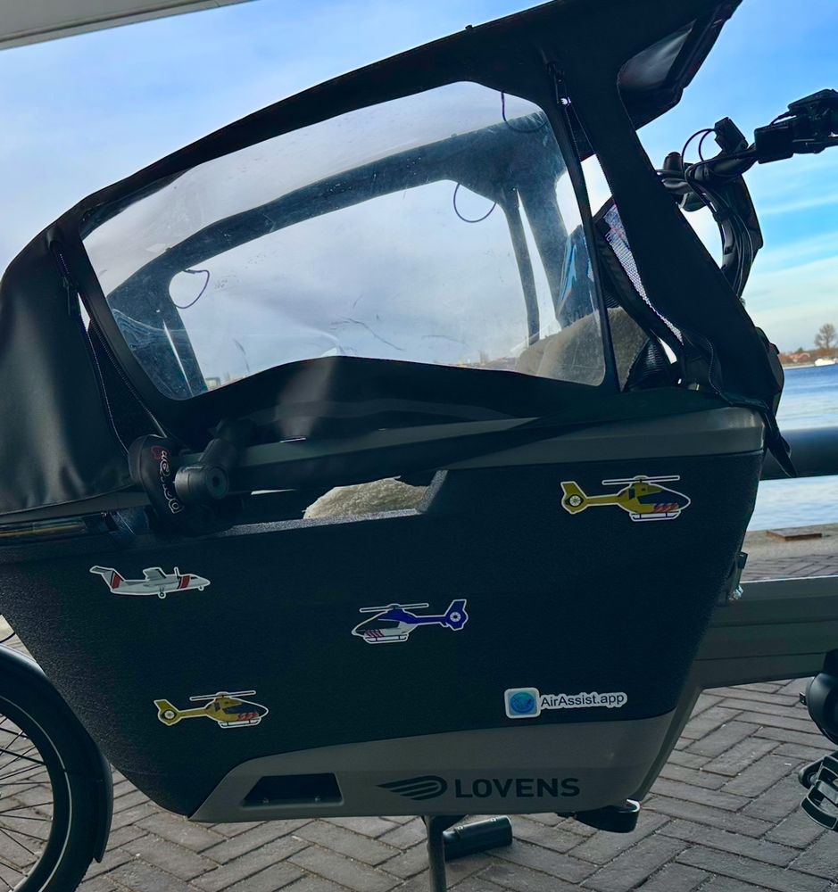 Cargo bike with AirAssist stickers on it
