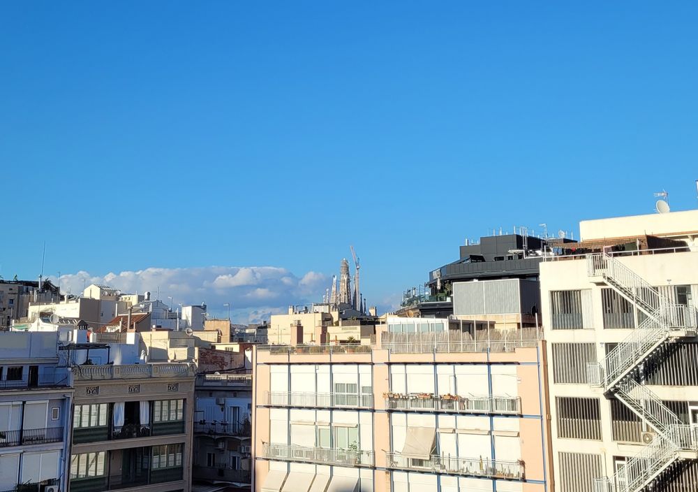 View from hotel terrace of Sagrada Familia in the middle distance