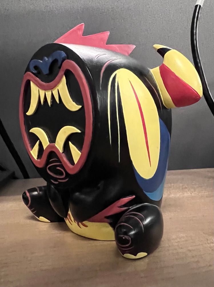 Photo of a resin monster figure by the artist Gnarf Death. 