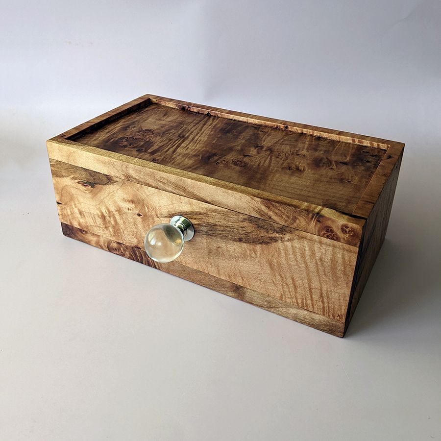 Desktop/Nightstand Organizer with Single Drawer and internal removable trays
Exterior Dimensions: 11" x 5.5" x 4"
Top built in tray-internal: 10.75" x 4.75" x 0.25"
Drawer-Internal: 9.5" x 4.5" x 2.5"
Small Drawer Trays: 3.375" x 3.675"

An organizer for your desktop or nightstand and designed with those needs in mind. Built to accommodate watches, fountain pens, pill organizers, combs, within while providing a stable surface up top for phone chargers, glasses, jewelry etc. Top lip prevents small items from falling onto the floor. Internal trays can be removed entirely if you desire the full drawer space. The trays can also sit on the top of the organizer and act as catch alls.