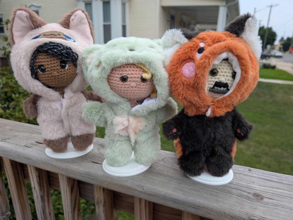 Ed Stede and Izzy dressed as cute fuzzy animals