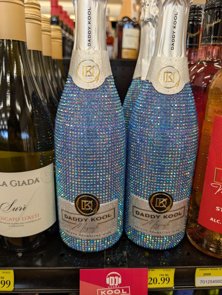 Sparkly blue sequined whine bottle called Daddy Kool