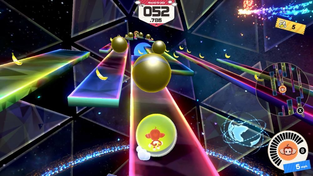 A screenshot taken mid-gameplay that features the monkey Palette in a yellow ball rolling through a more difficult version of level 10-3, that now has large marbles blocking many paths.