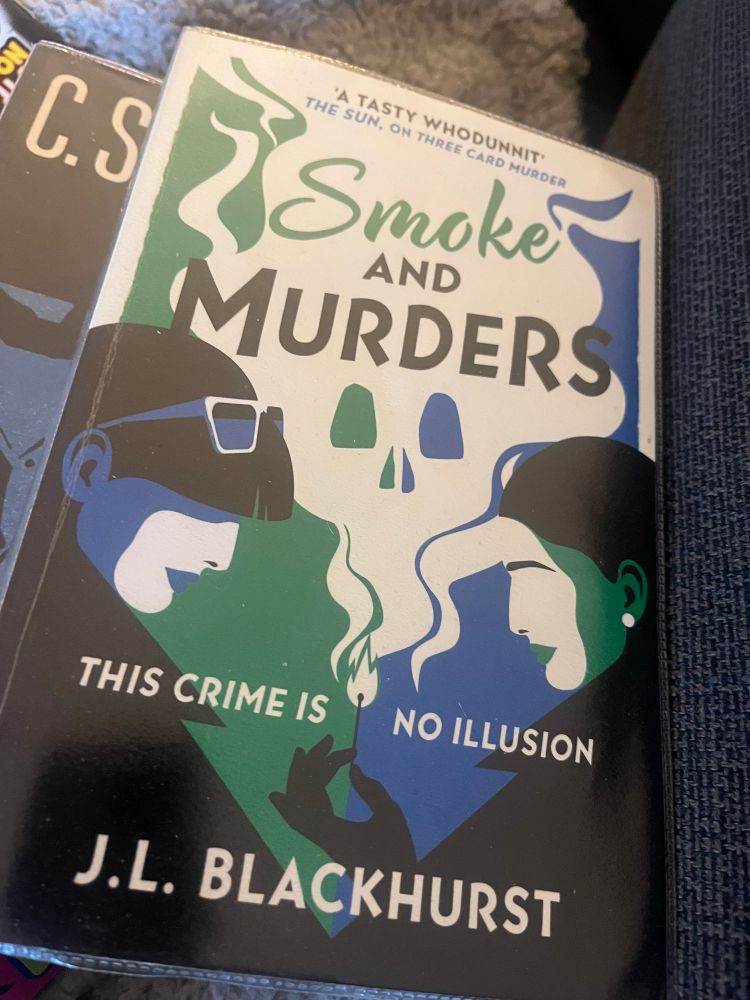 Book cover of Smoke And Murders by J L Blackhurst 