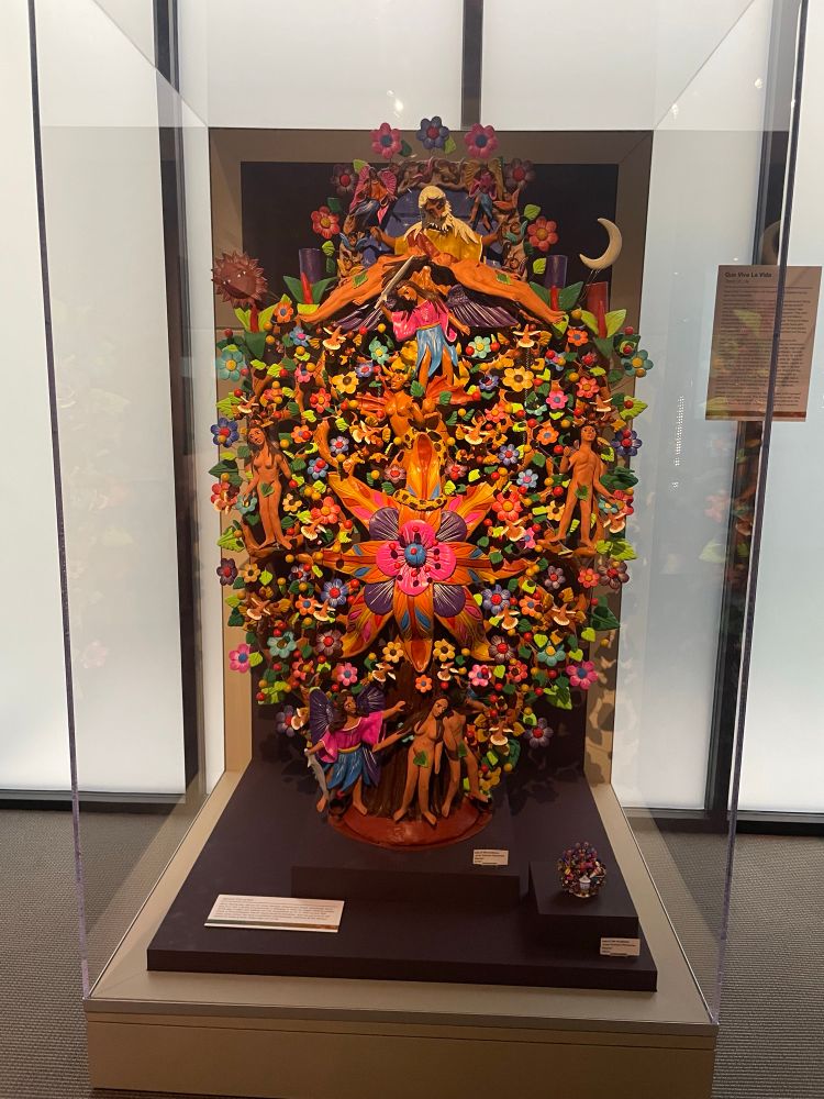 I don’t know what you would call this, but it’s like a mosaic of bright colors made of figures of people and flowers