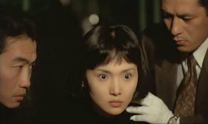 Kaho Minami casts a steely glance in the film Angel Dust.
