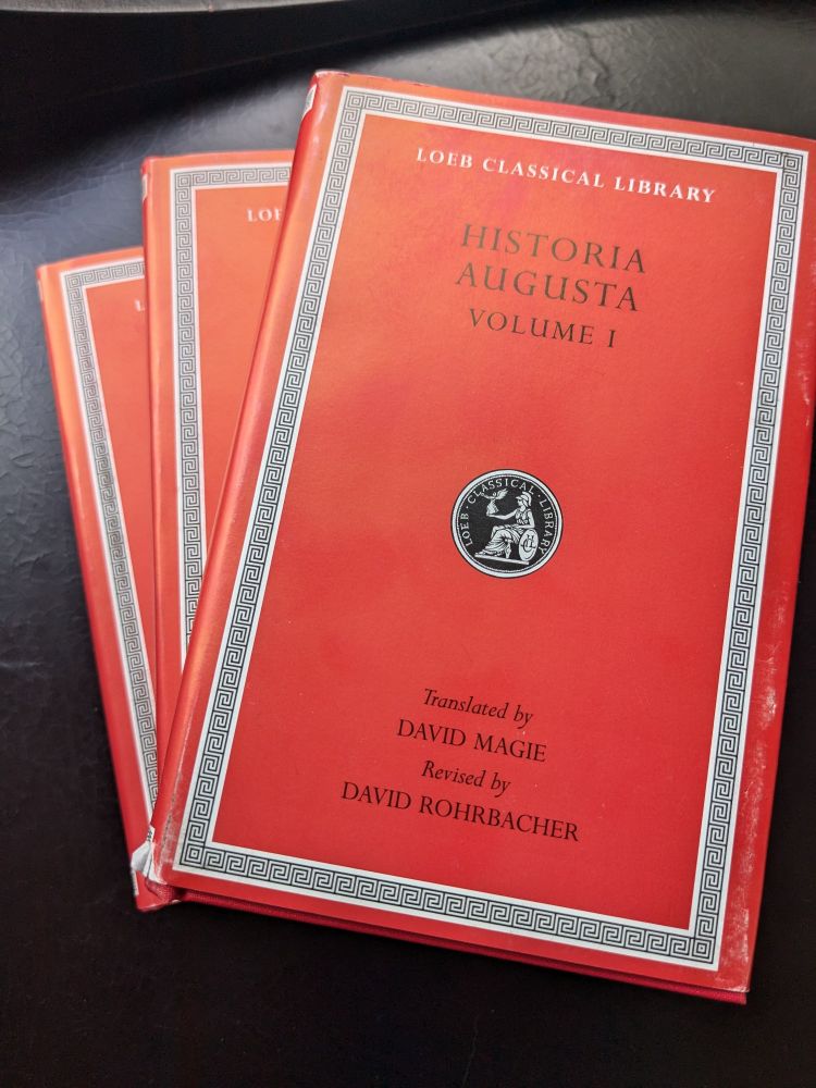 Fanned copies of three Loeb volumes of the Historia Augusta.