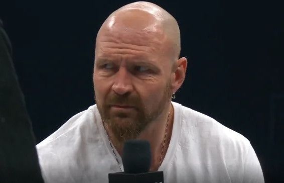 Jon Moxley, leader of the Death Riders side eyeing the crowd in confusion and disgust as they chant “Bald” at him. The look almost betrays disappointment in Mox’s eyes, like he expects better from them. 