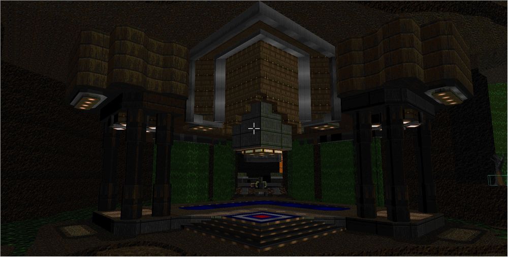 screenshot of an unfinished doom map.

a bronze structure, held up by pillars, a triangle staircase leading up, and suspended lights.