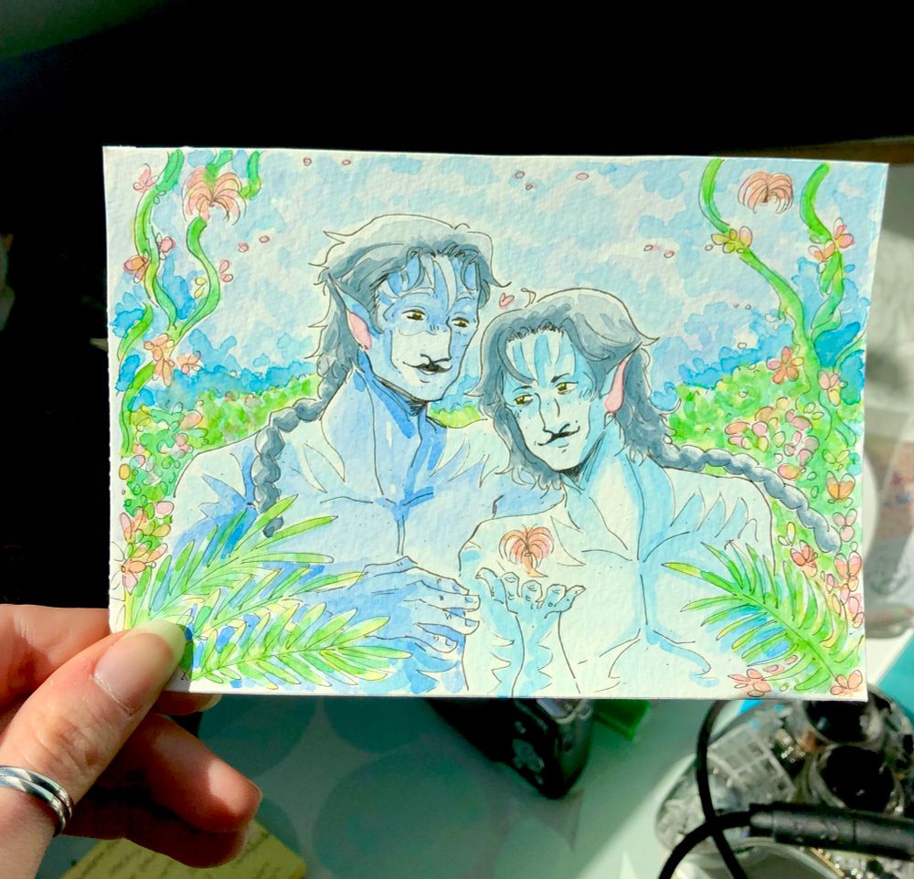An A6 format watercolor with bright colors featuring Jayce and Viktor from Arcane, as an Avatar!Alternate Universe version of themselves. They are holding Eywa spirits in the jungle, and looking at each other tenderly.