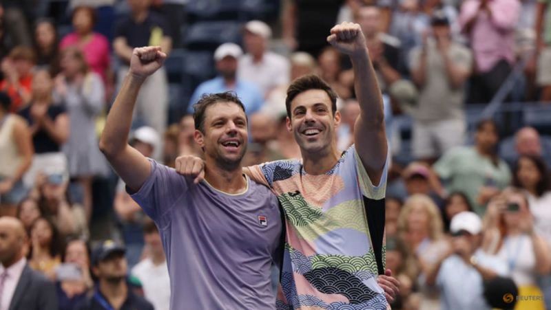 NEW YORK :Marcel Granollers and Horacio Zeballos saved three match points on their way to a dramatic 3-6 7-6(4) 7-5 win over British pair Joe Salisbury and Neal Skupski in the U.S. Open men's doubles final on Saturday to seal a second Grand Slam title this year.The fifth-seeded Spanish-Argentine duo reaffirme