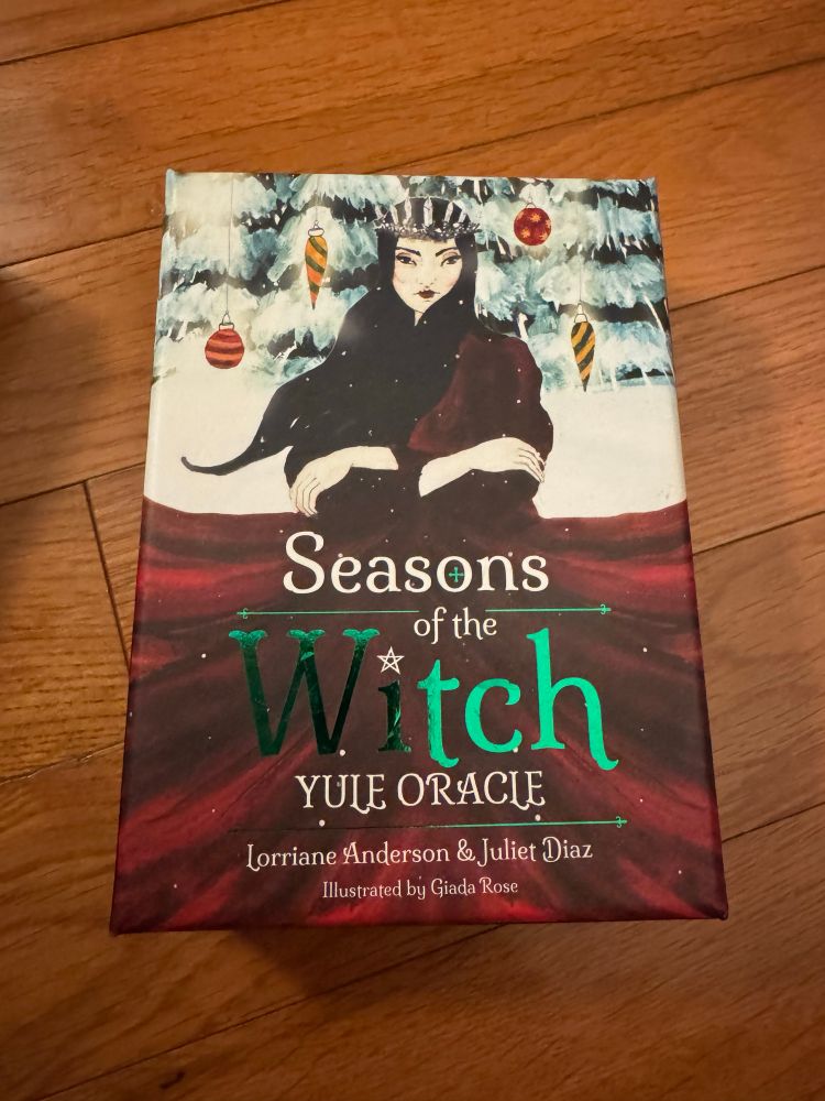 photo of a box of yule-themed oracle cards