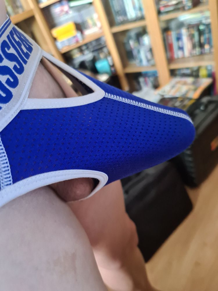 A side shot of Bezels erect penis in a jock