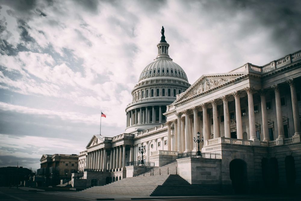 the U.S. Capitol building on an overcast day, looking ominous