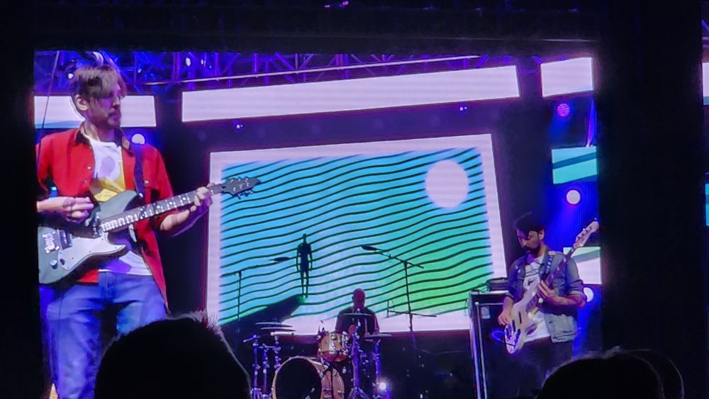 A screen showing the band Red Vox