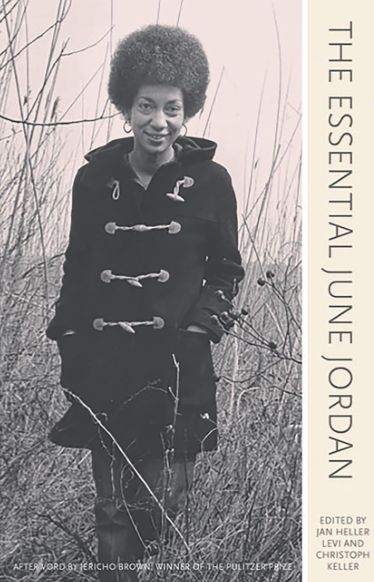 The cover of The Essential June Jordan. The cover is primarily made up of a black and white photo of June Jordan, with the title running sideways along a thin margin on the right side.