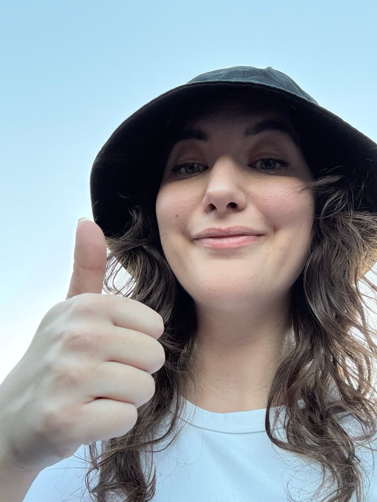 Lucy wearing a bucket hat