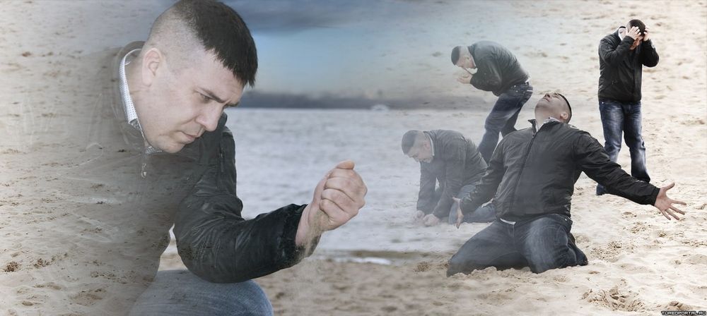 guy mourning in sand dramatically 