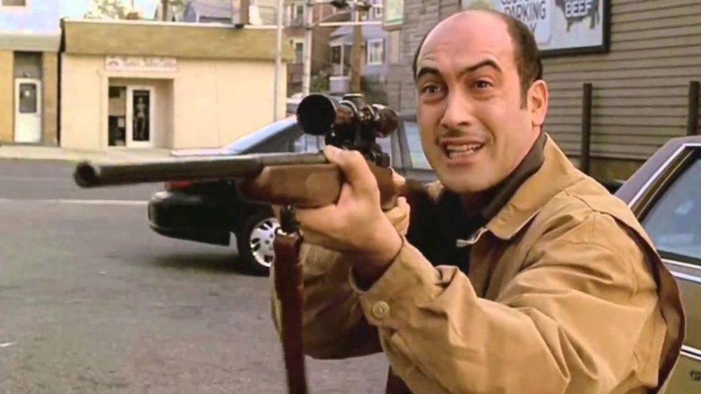 the iconic Artie from Sopranos pointing a rifle meme