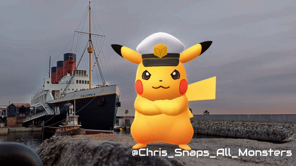 A snapshot of the Pokémon (Captain) Pikachu during sunset, standing on a rock next to the SS Columbia at Tokyo DisneySea.