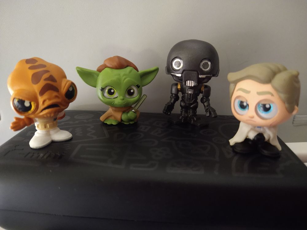 Admiral Ackbar, Yaddle, K-2SO, and Orson Krennic Doorables.