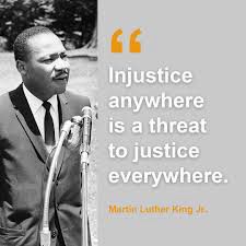A picture of MLK, Jr. and quote “Injustice anywhere is a threat to justice everywhere.”