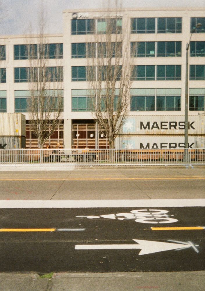 a photo of seattles street, with a railroad track behind it