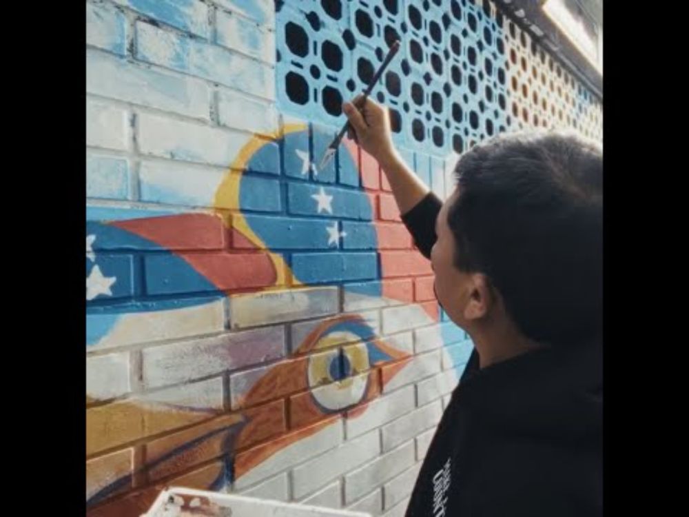 Climate Refugees in the Global South: a community mural project