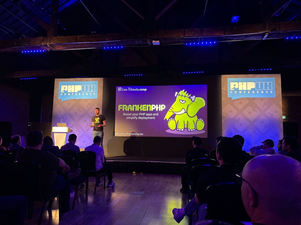 Kévin Dunglas on stage at PHP UK Conference