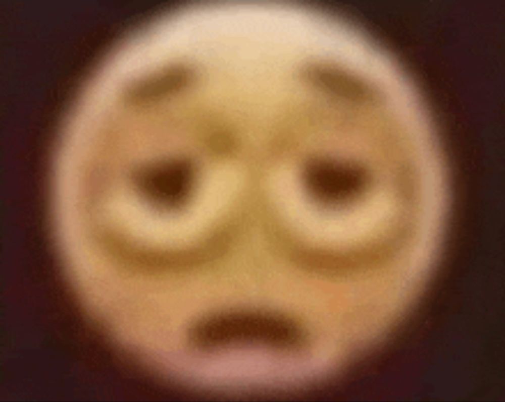 Blurry tired emoji face
